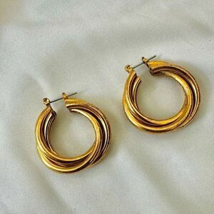 Gold tone twisted hoop earrings